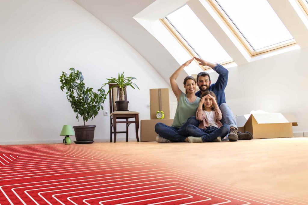 Joyful family spending time together beneath a skylight installed by Vancouver roofing professionals